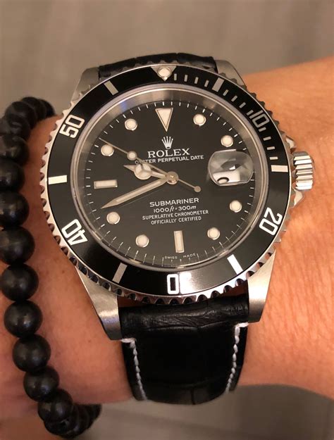 rolex with black leather band